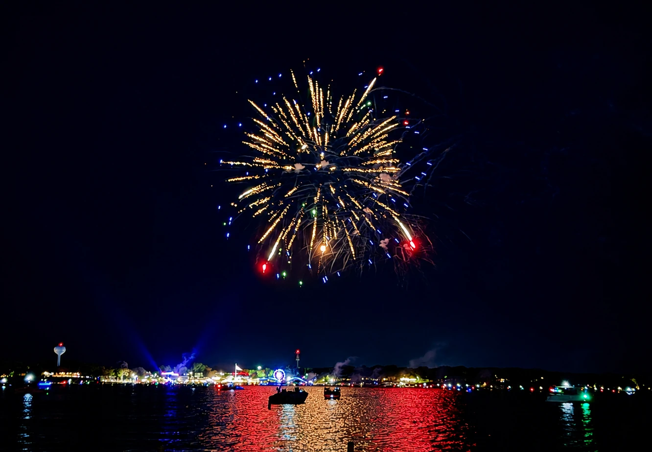 Fireworks over West Okoboji Lake at night