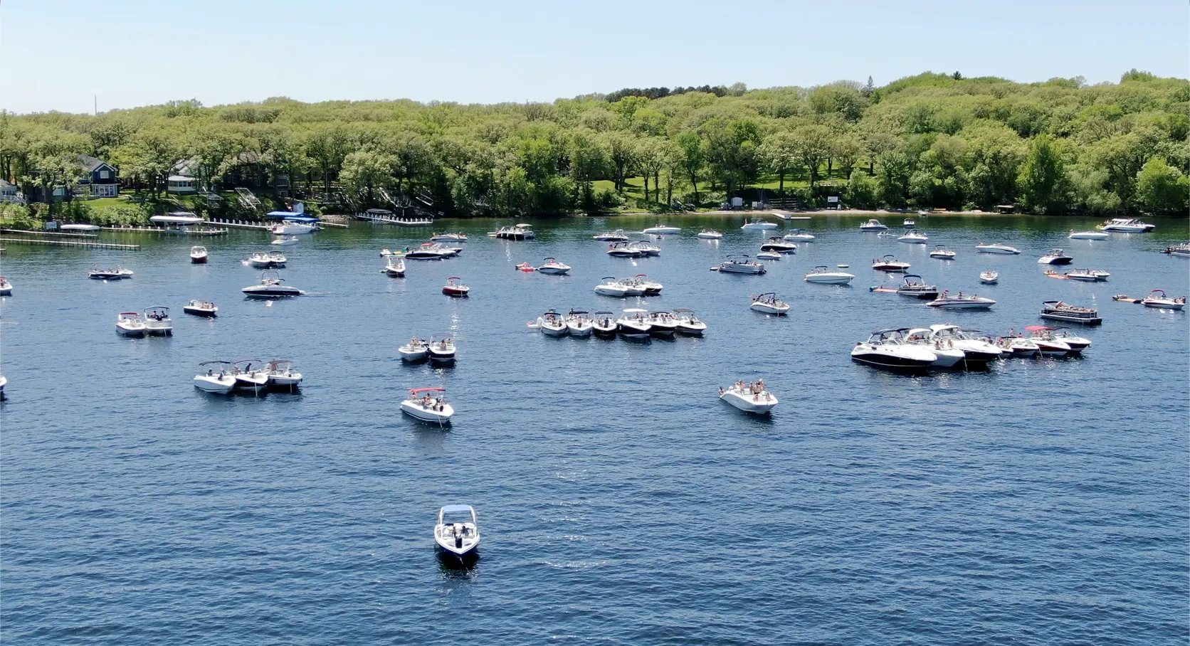 Boats anchored in Millers Bay on West Lake Okoboji, the bay Wahpeton, Iowa calls home